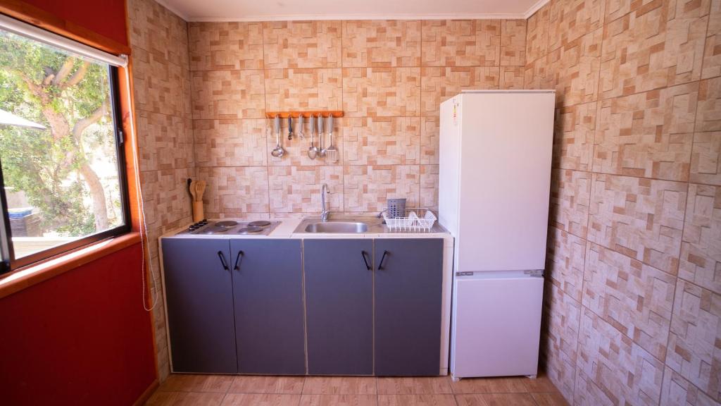 Kuchyň nebo kuchyňský kout v ubytování cabañas laguna de zapallar maitencillo