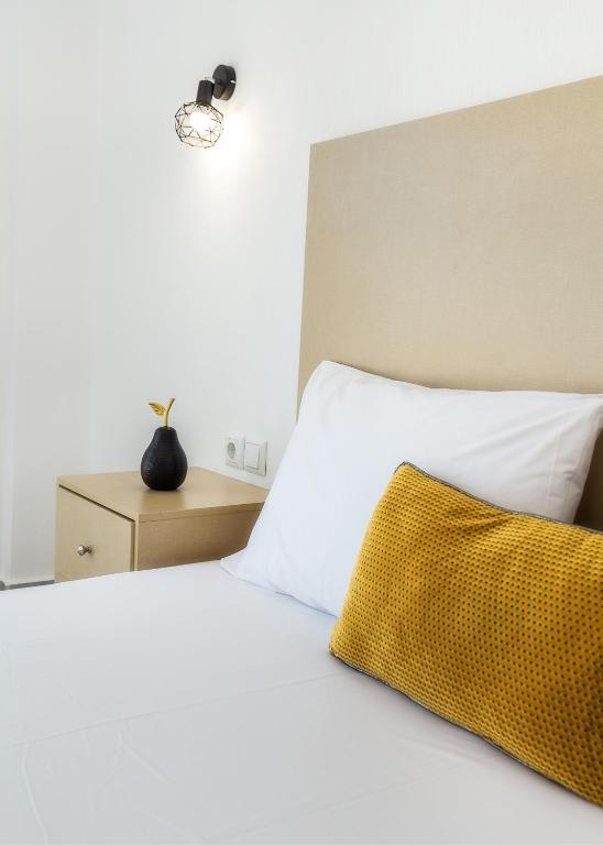 Postel nebo postele na pokoji v ubytování Ermioni Sea View Hotel