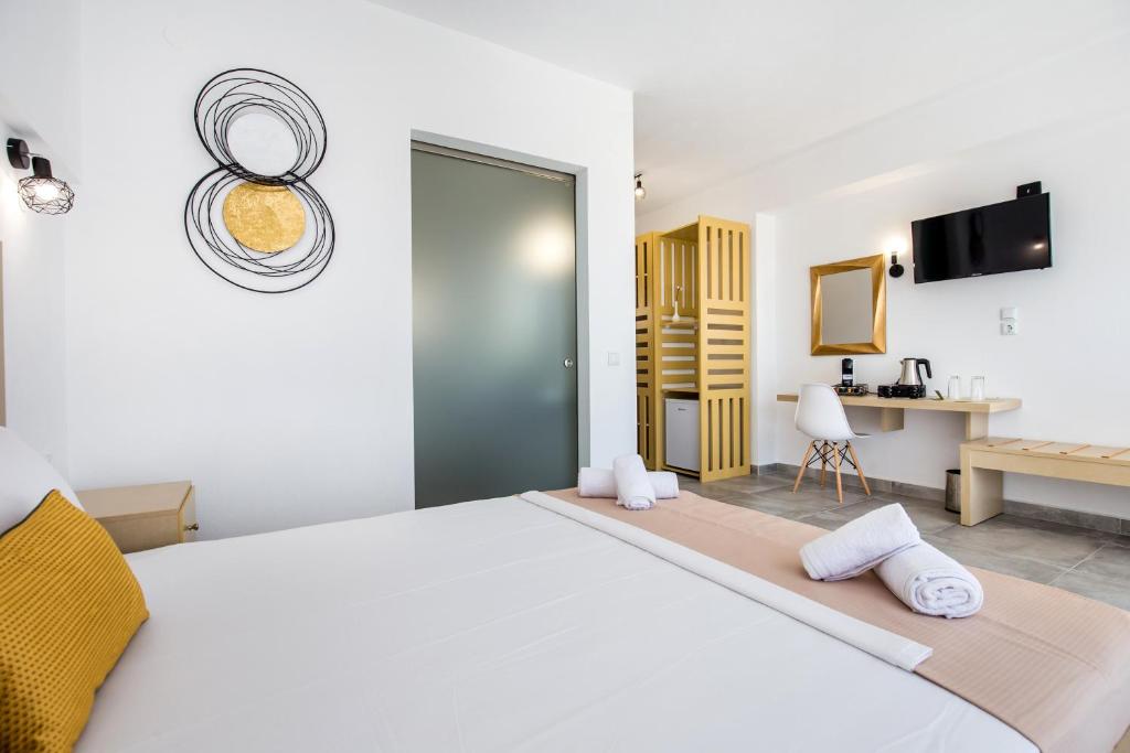 Postel nebo postele na pokoji v ubytování Ermioni Sea View Hotel