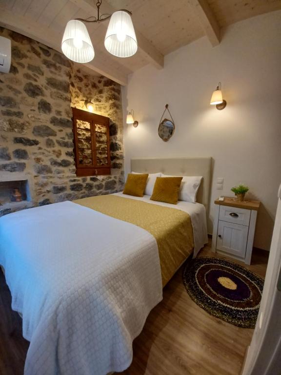 Postel nebo postele na pokoji v ubytování Rodanthe's Guest House
