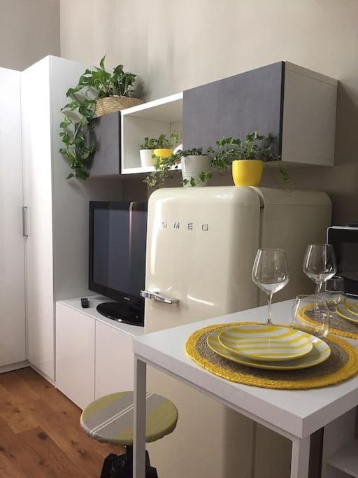 A kitchen or kitchenette at Room114 - Studio apartment near the center