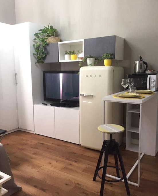 A kitchen or kitchenette at Room114 - Studio apartment near the center