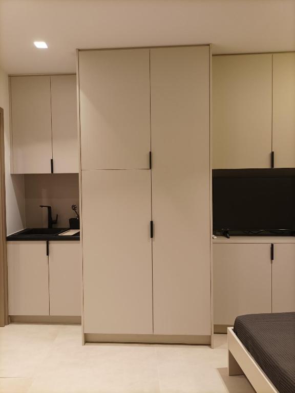A kitchen or kitchenette at Evripidou Experience - The smart double C
