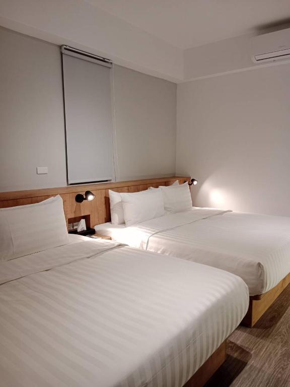 Postel nebo postele na pokoji v ubytování Ocean Guest House