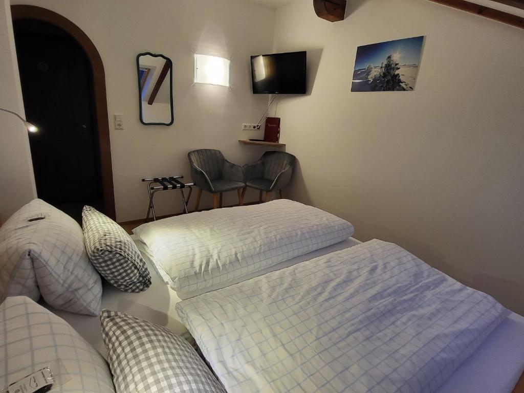 Postel nebo postele na pokoji v ubytování Haus Miriam
