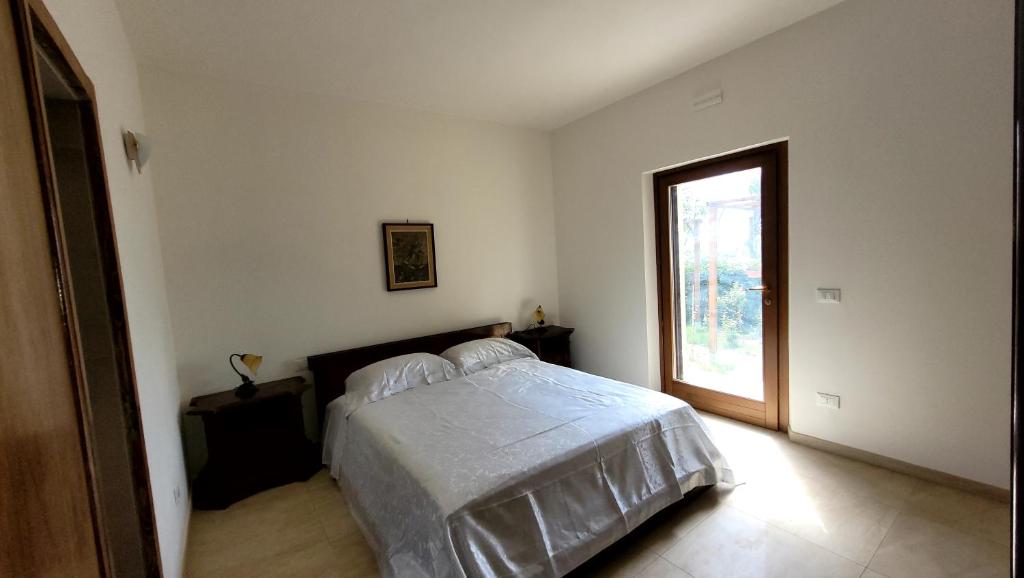 Posteľ alebo postele v izbe v ubytovaní Agriturismo Poggio la Lodola
