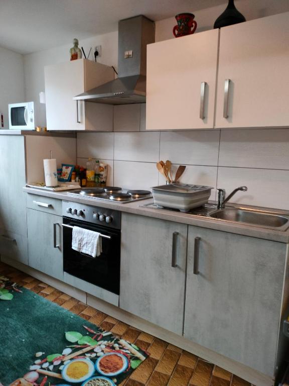 Kuchyň nebo kuchyňský kout v ubytování Ferienwohnung TAL-ECK