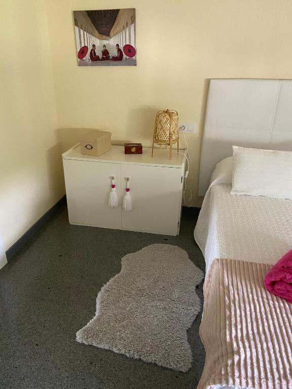 Postel nebo postele na pokoji v ubytování Villa Bimba, alojamiento con piscina y barbacoa