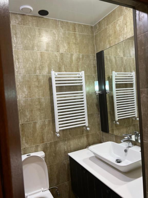 Koupelna v ubytování Green Hotel ANG