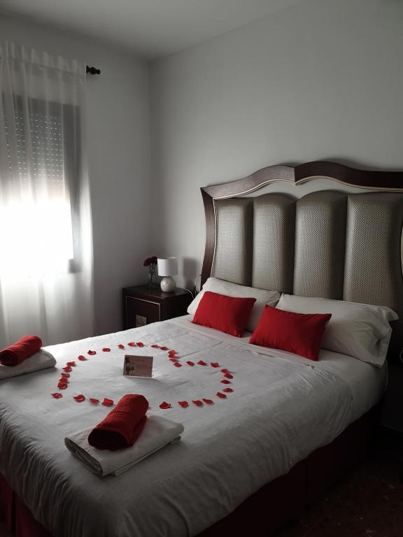 Postel nebo postele na pokoji v ubytování Casa Maria