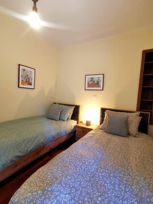 Posteľ alebo postele v izbe v ubytovaní Lucy's apartment