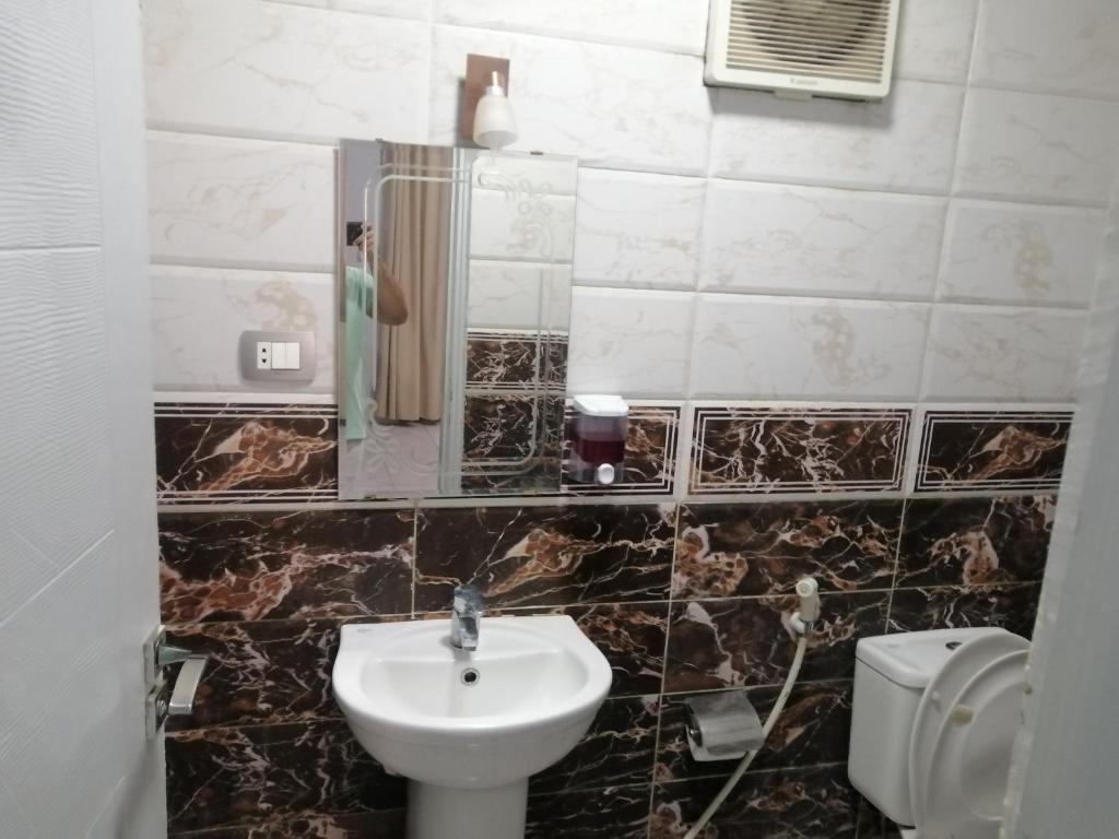 Koupelna v ubytování Gardenia Hotel