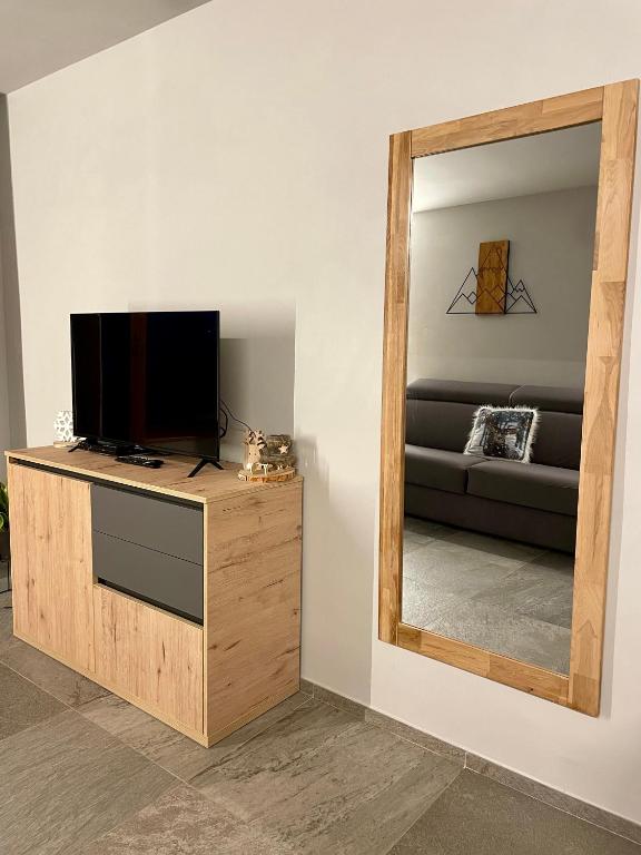 TV a/nebo společenská místnost v ubytování Maison Etoile - Pila n 0042