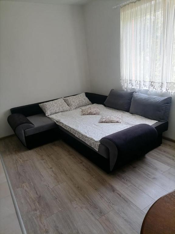 Postel nebo postele na pokoji v ubytování Apartmani Vesna