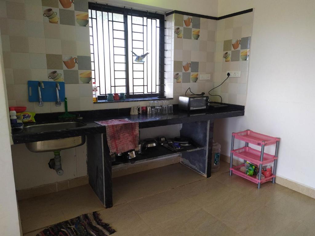 Kuchyň nebo kuchyňský kout v ubytování Jiten Homestay