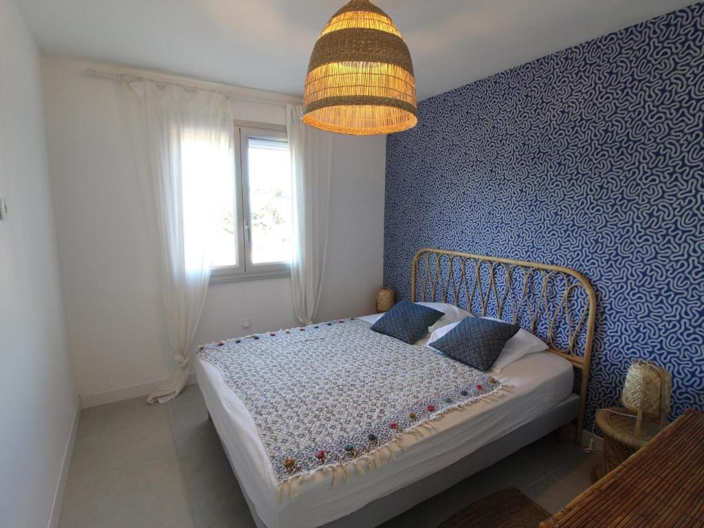 Posteľ alebo postele v izbe v ubytovaní Appartement moderne climatisé avec Wi-Fi à 300m du centre-ville et de la plage à Collioure - FR-1-309-355