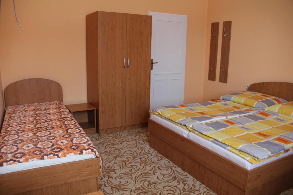 Postel nebo postele na pokoji v ubytování U Mami