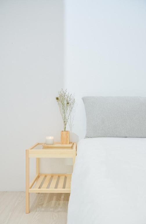 Postel nebo postele na pokoji v ubytování White Space Design Hotel
