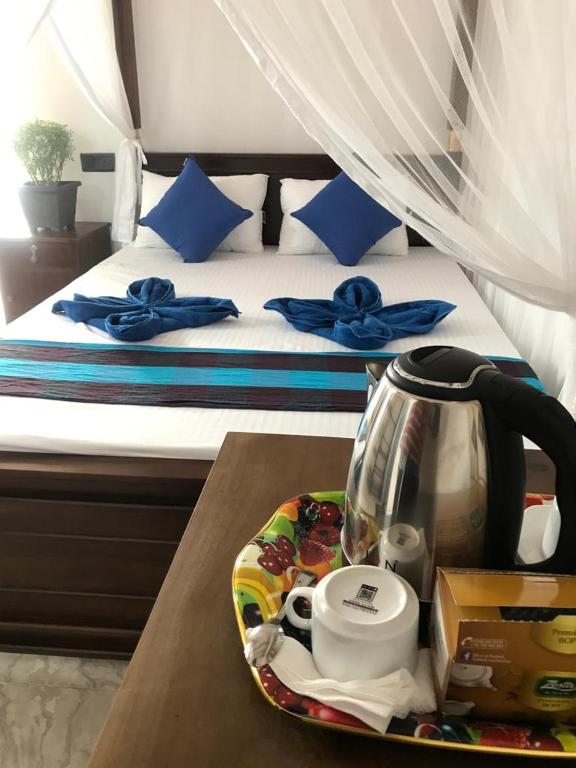 Příslušenství pro přípravu čaje a kávy v ubytování Bisandu guesthouse