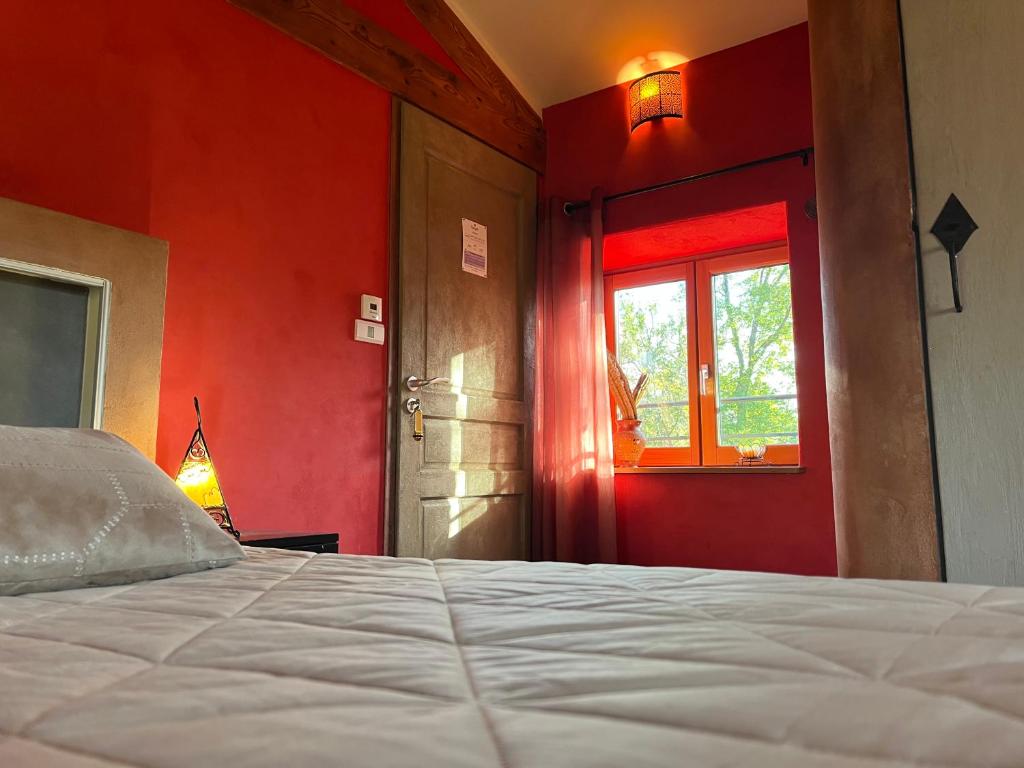 Postel nebo postele na pokoji v ubytování Domaine de Pipangaille