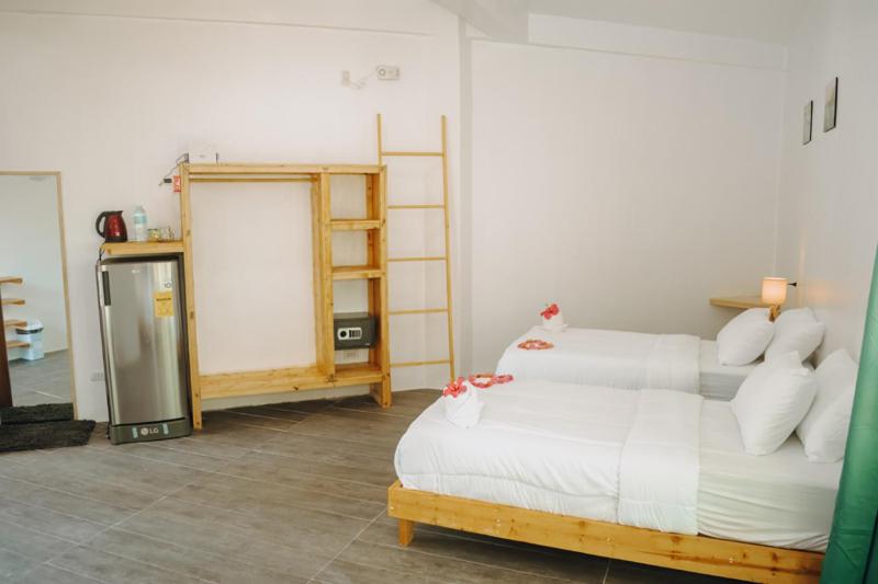 Postel nebo postele na pokoji v ubytování johandive