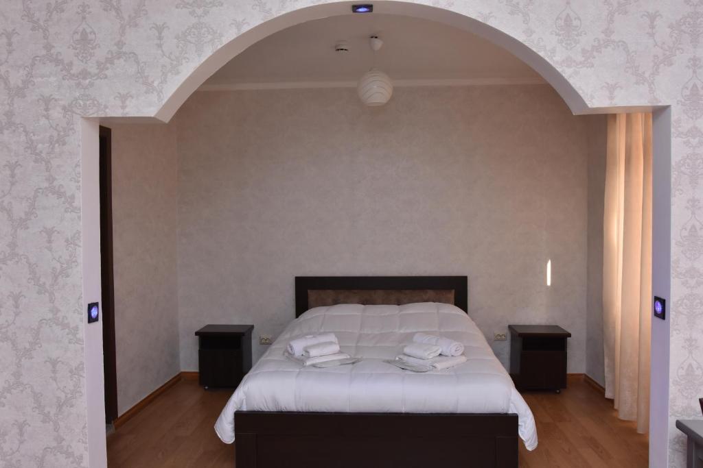 Postel nebo postele na pokoji v ubytování HOTEL SAMEGRELO