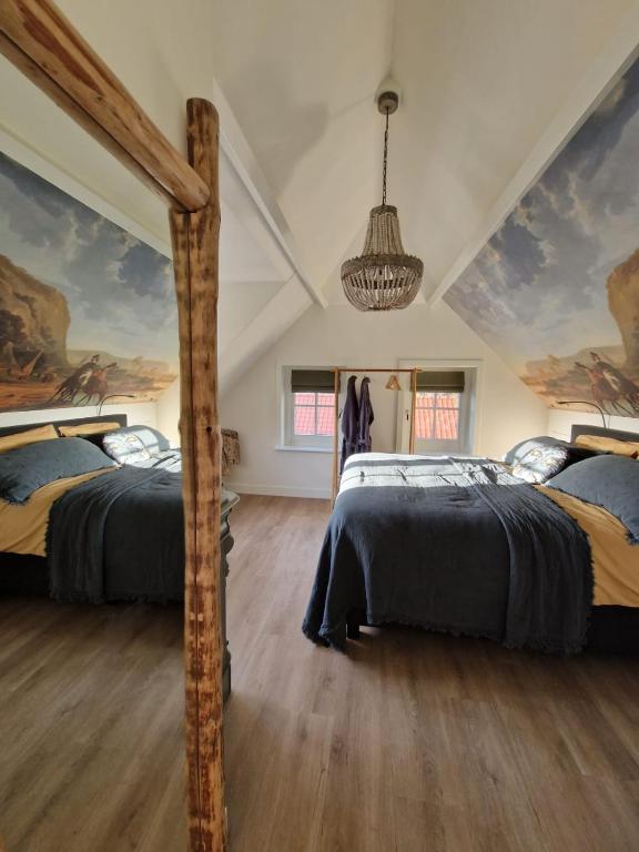 Postel nebo postele na pokoji v ubytování Bed & Breakfast Hoeve Happiness - ontbijt inbegrepen - wellness aanwezig