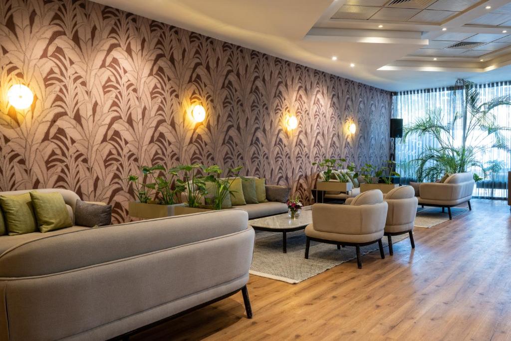 Posezení v ubytování Astral Village Hotel