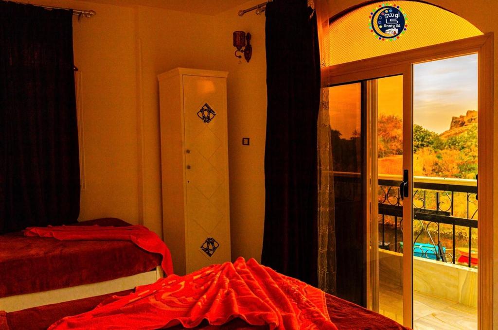 Postel nebo postele na pokoji v ubytování Onaty Ka Guest House
