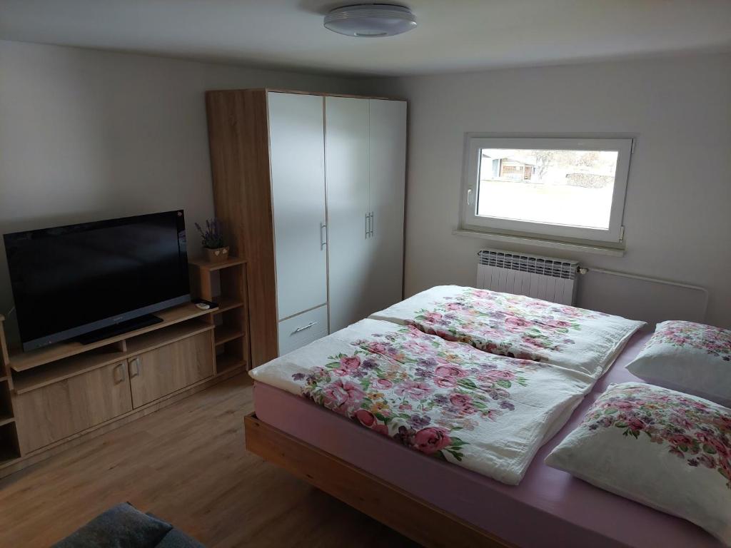 Postel nebo postele na pokoji v ubytování Apartments Marica