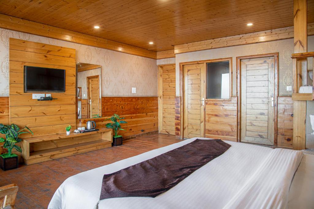 TV a/nebo společenská místnost v ubytování JK Dream View Kufri