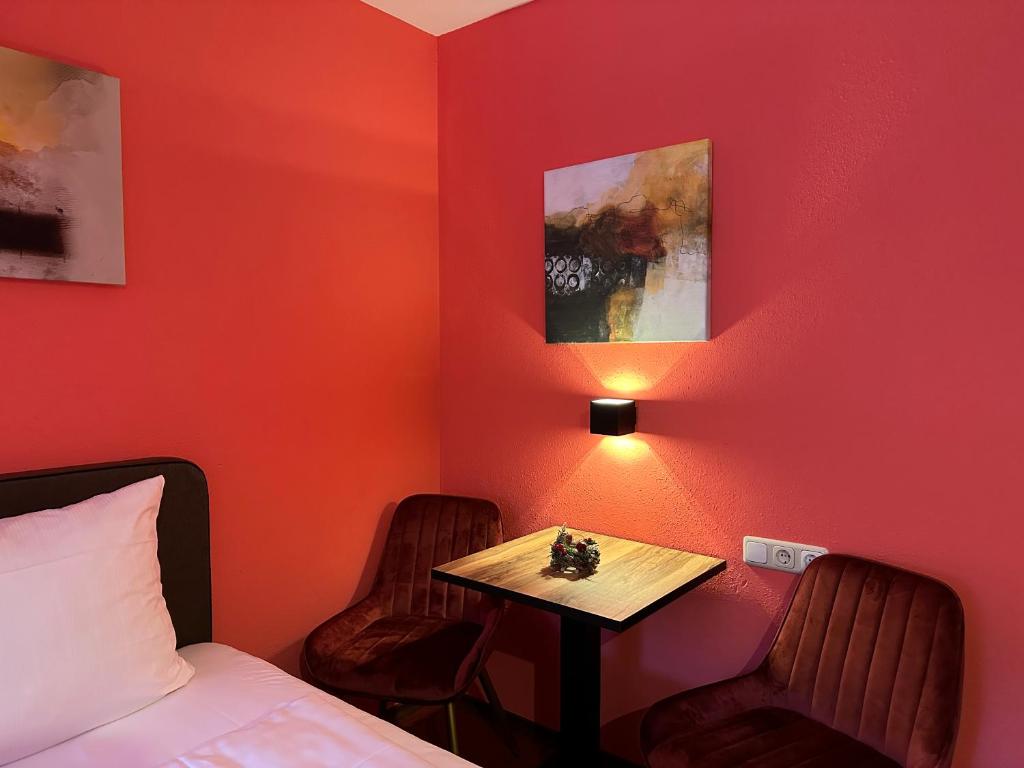 Postel nebo postele na pokoji v ubytování Maiers Hotel