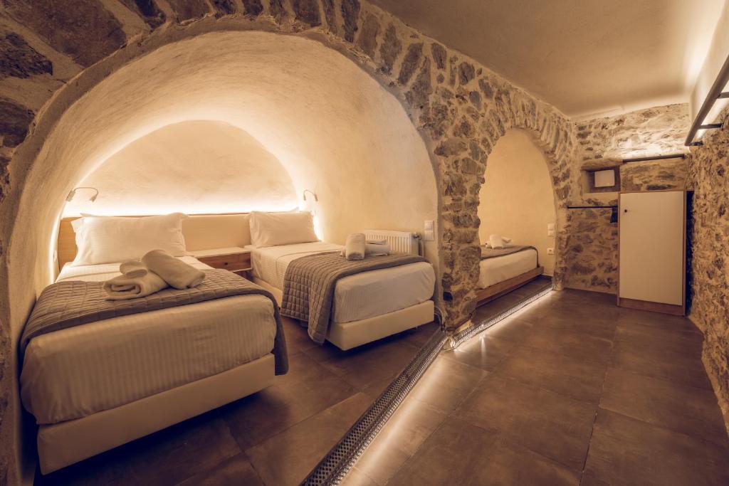 Posteľ alebo postele v izbe v ubytovaní Gileri eco & design Residences