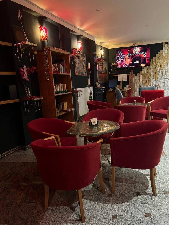 TV a/nebo společenská místnost v ubytování Gallery Hotel SIS