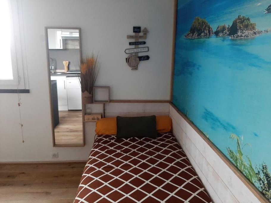 Posteľ alebo postele v izbe v ubytovaní Songe Tropical-InvIRI. Studio CHU. Parking Aisé.
