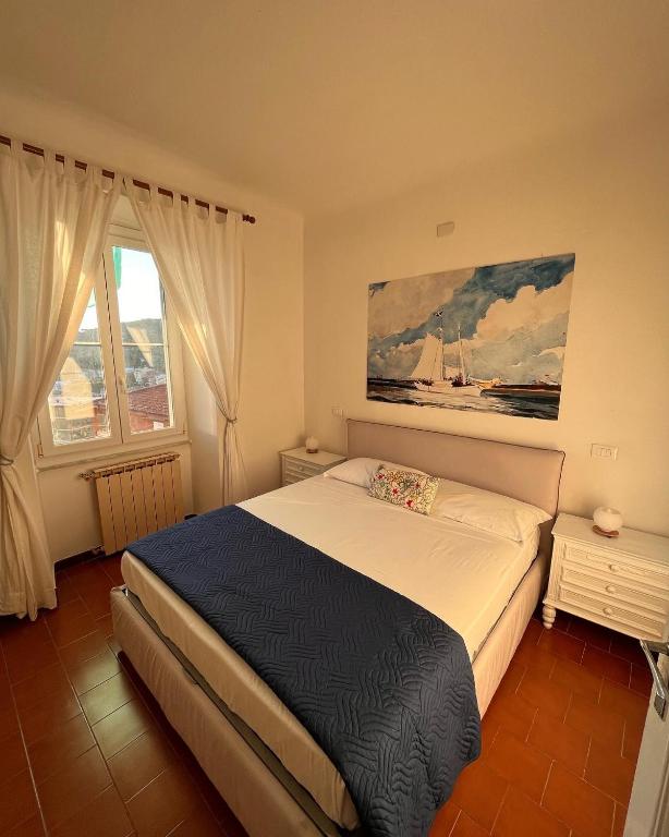 Postel nebo postele na pokoji v ubytování Casa Le Grazie