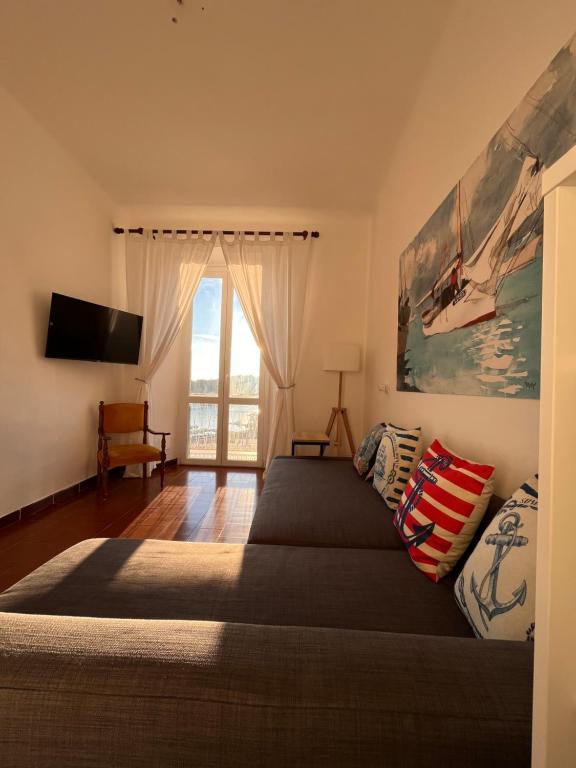 Postel nebo postele na pokoji v ubytování Casa Le Grazie