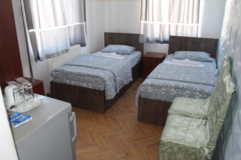 Postel nebo postele na pokoji v ubytování 21 На удачу