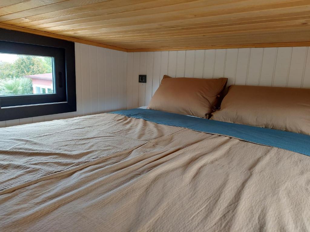 Postel nebo postele na pokoji v ubytování Defneland Daphne