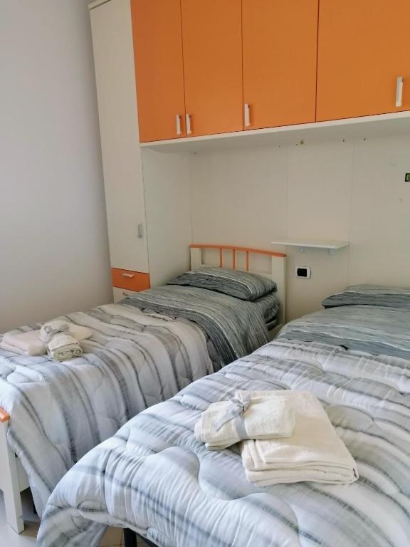 Posteľ alebo postele v izbe v ubytovaní B&B Nausica