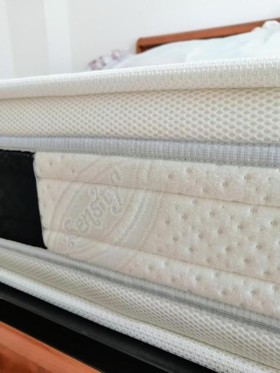 Posteľ alebo postele v izbe v ubytovaní B&B Nausica