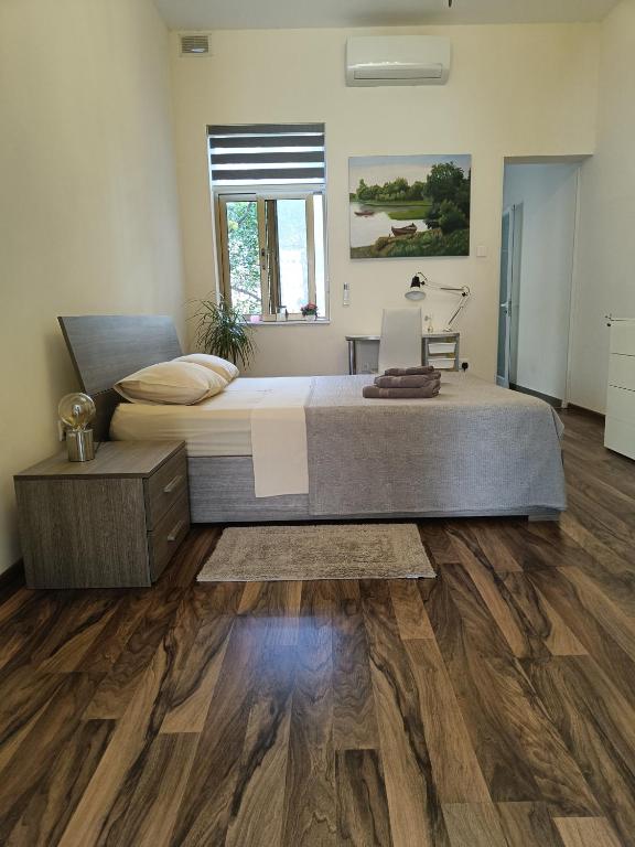 Postel nebo postele na pokoji v ubytování Modern stylish flat near Valletta and Sliema!