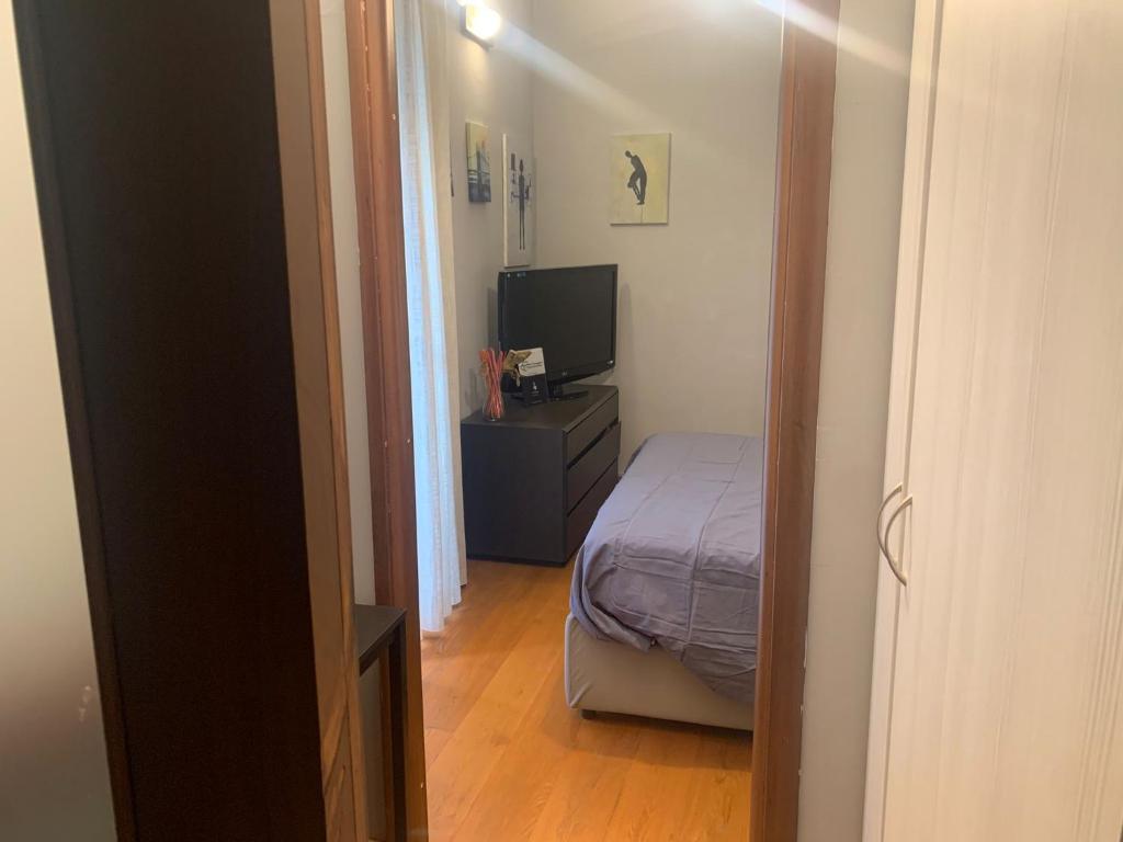 Łóżko lub łóżka w pokoju w obiekcie O' Sapunariello-Casa Vacanze