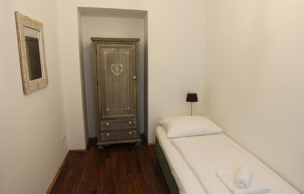 Posteľ alebo postele v izbe v ubytovaní Casa Nostra - Ausgefallene Wohnung am Augarten