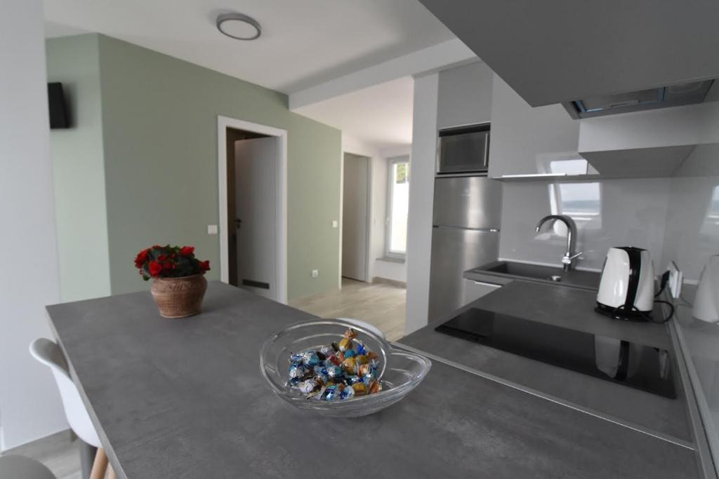 Kuchyňa alebo kuchynka v ubytovaní Zsolna Apartman
