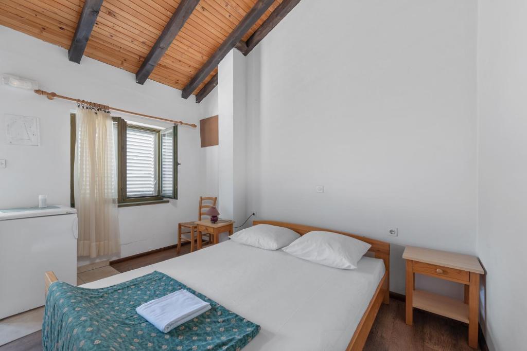 Postel nebo postele na pokoji v ubytování Aparthotel Vila Danica