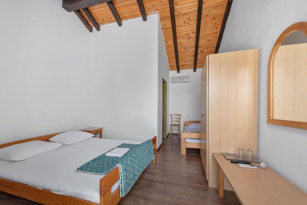 Postel nebo postele na pokoji v ubytování Aparthotel Vila Danica