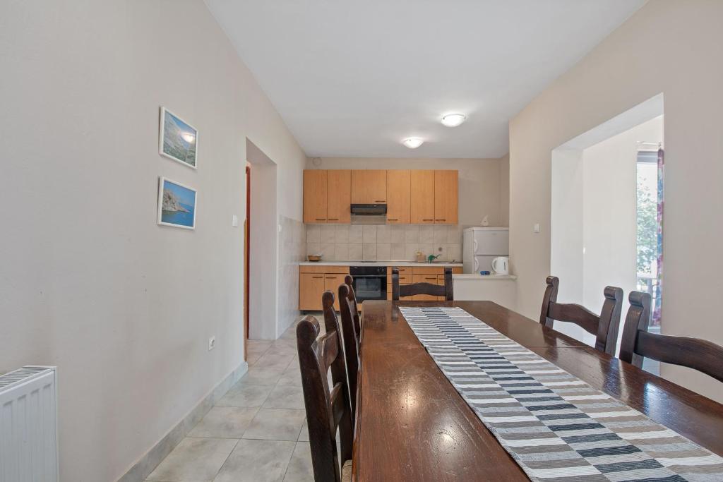 Kuchyň nebo kuchyňský kout v ubytování Aparthotel Vila Danica
