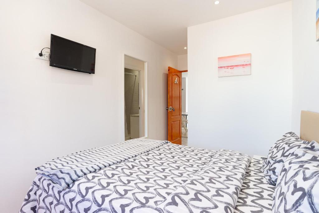 Postel nebo postele na pokoji v ubytování Rooms Breeze & Sun