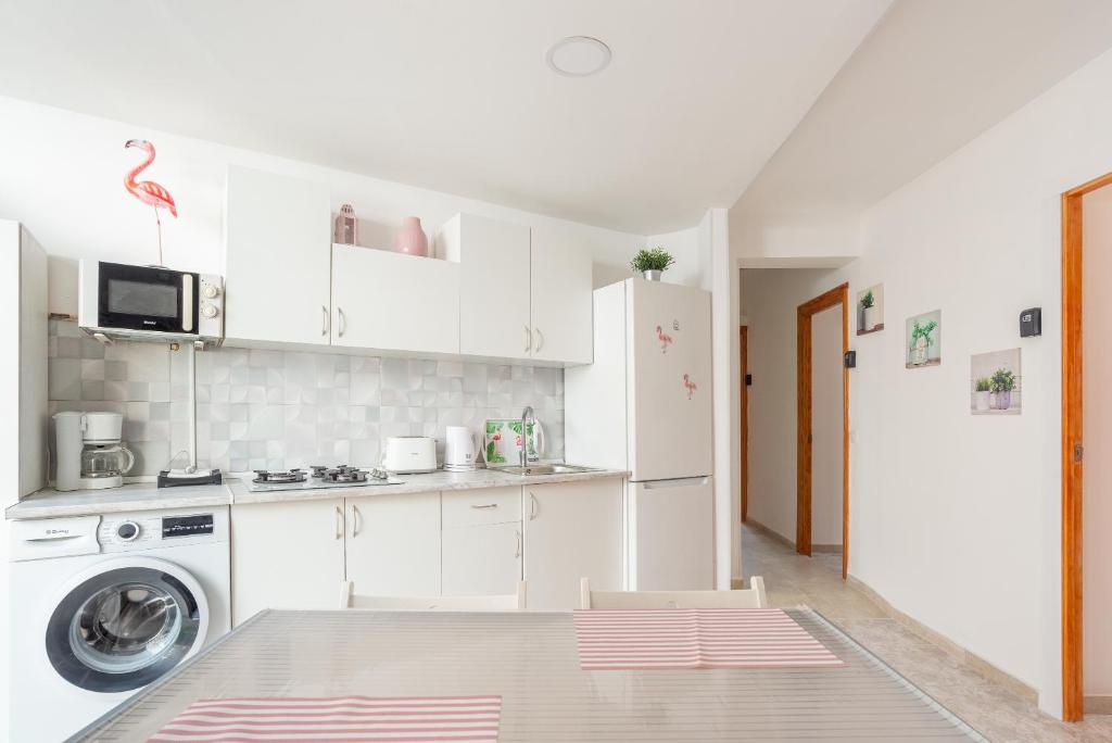 Kuchyň nebo kuchyňský kout v ubytování Rooms Breeze & Sun